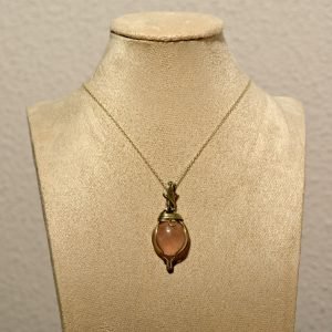 Colgante exclusivo de cuarzo rosa en plata: belleza y significado